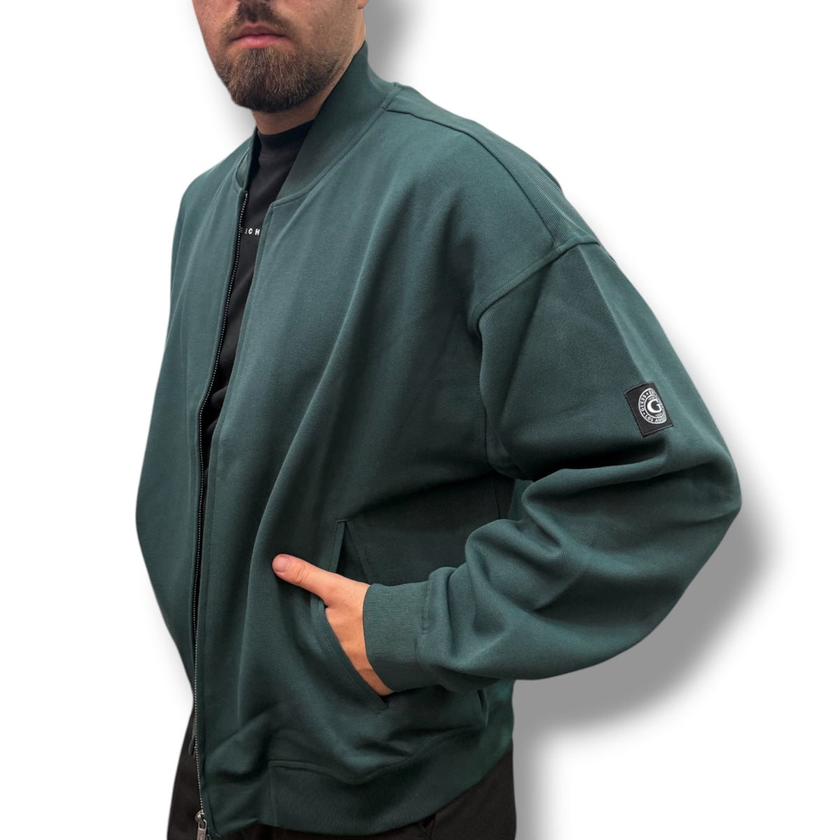 GUESS- Giubbofelpa Uomo, con zip e senza cappuccio, tex.cotone garzato (Oversized Fit), Col.Verde