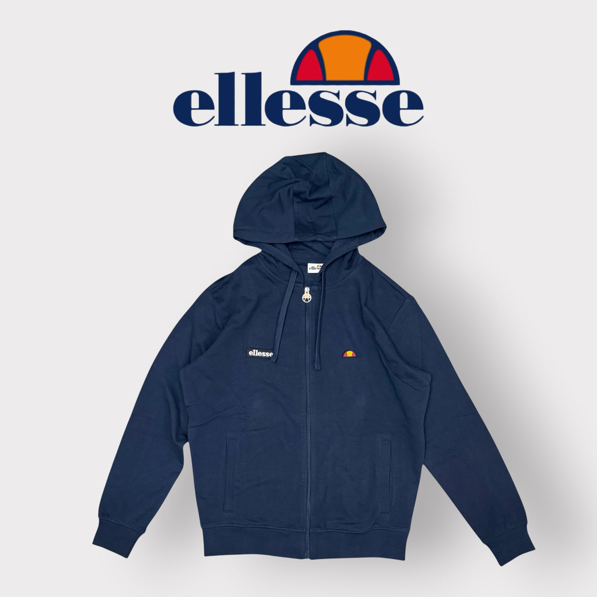 ELLESSE - Felpa Uomo con logo ricamato piccolo, con cappuccio e zip, Col.Blu