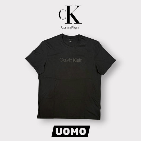 CALVIN KLEIN - T-Shirt Uomo con scritta frontale gommata, Col.Nero