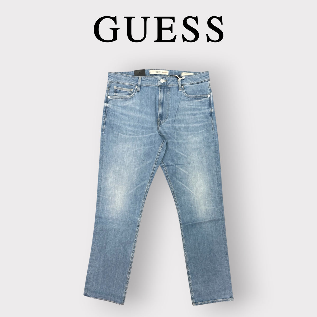 GUESS JEANS- Jeans Uomo, mod.SlimFit Medium Rise Tapered Leg, Lavaggio chiaro