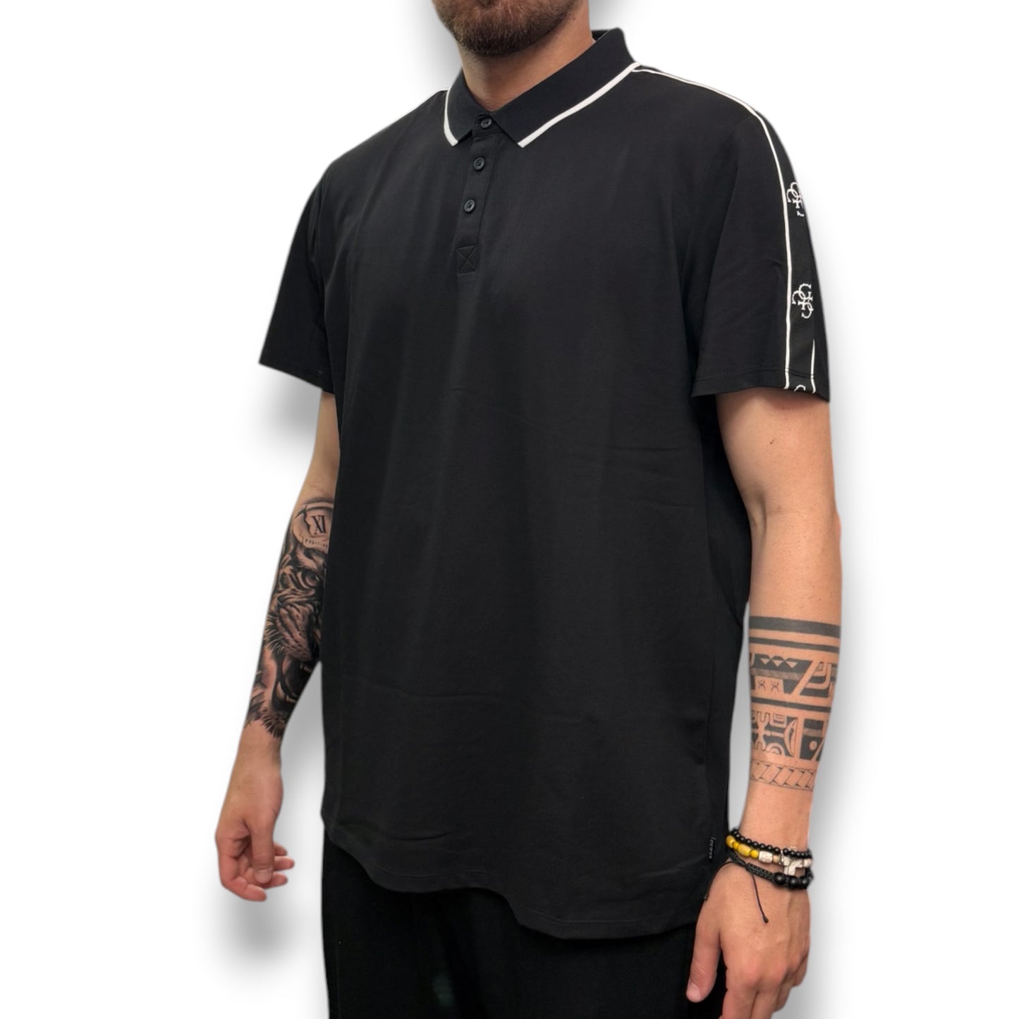 GUESS- Polo Uomo, in tessuto tecnico, con logo sulle spalle, Slim Fit, col.Nero
