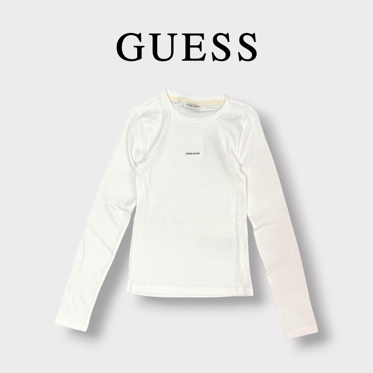 GUESS JEANS- T-shirt Donna, manica lunga, tex.costine, con targhetta frontale piccola, Col.Bianco